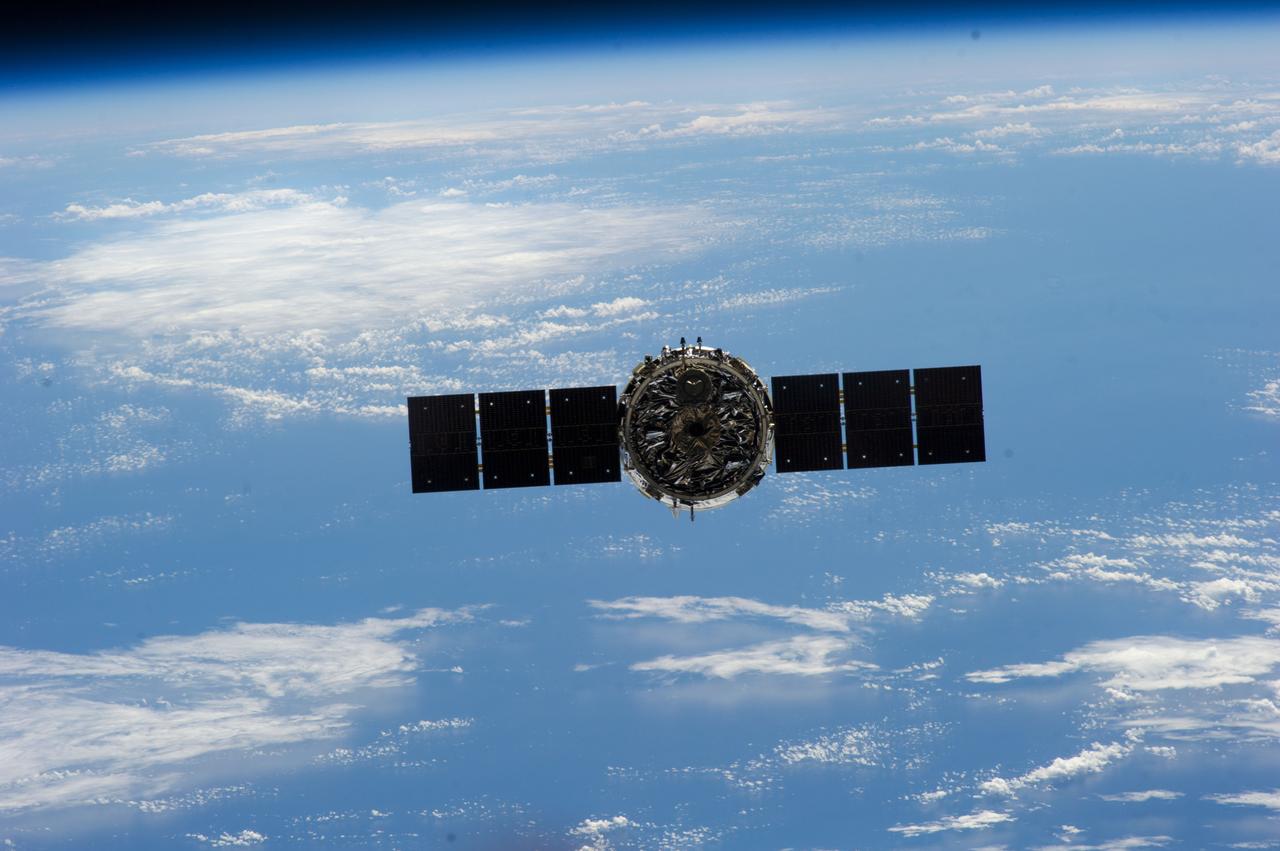 ISS038-E-050755 (18 Feb. 2014) --- The Orbital Sciences Corporation's Cygnus spacecraft begins its relative separation from the International Space Station after several weeks at the station. NASA astronaut Mike Hopkins, with assistance from Japan Aerospace Exploration Agency astronaut Koichi Wakata, both Expedition 38 flight engineers, used the station's 57-foot Canadarm2 robotic arm to detach Cygnus from the Earth-facing port of the Harmony node at 5:15 a.m. (EST) on Feb. 18, 2014. While Wakata monitored data and kept in contact with the team at Houston's Mission Control Center, Hopkins released Cygnus from the robotic arm at 6:41 a.m. A blue and white part of Earth provides the backdrop for the scene.