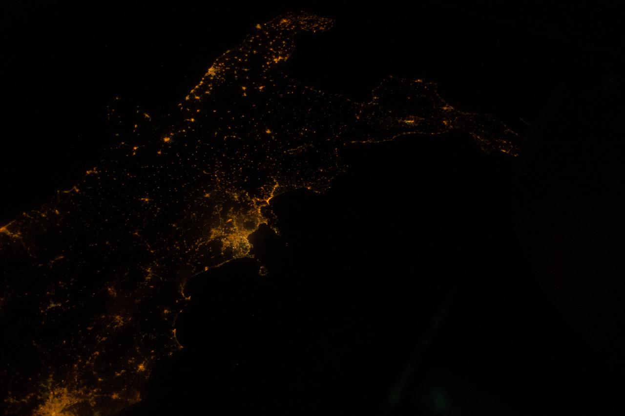 Earth observation taken by the Expedition 39 crew aboard the ISS. Night view of city lights. Image was released by astronaut on Twitter and downlinked in folder: north lights.