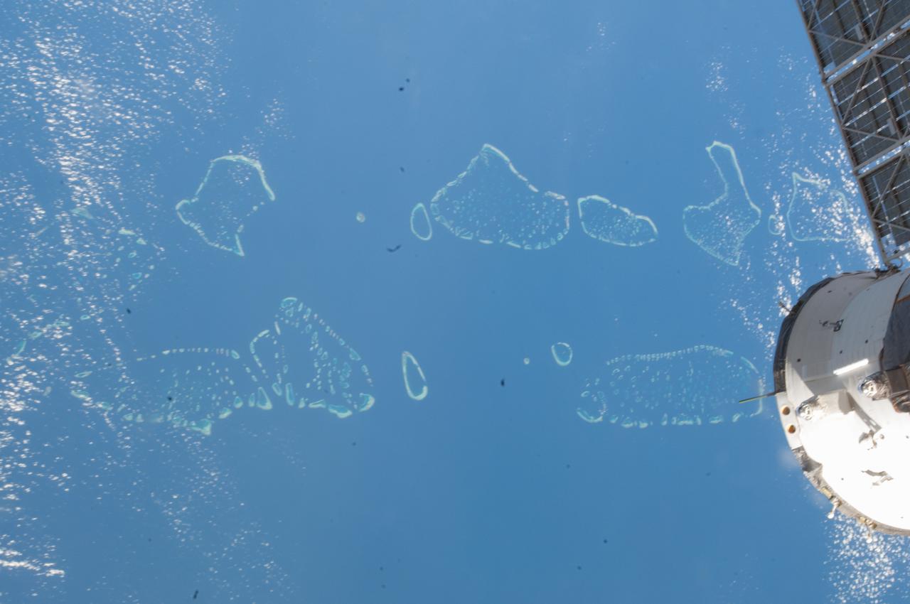Earth observation taken by the Expedition 39 crew aboard the ISS. A portion of the docked Soyuz TMA-11M spacecraft is in view. Image was released by astronaut on Instagram and downlinked in folder: Personal photos and the Maldive islands.