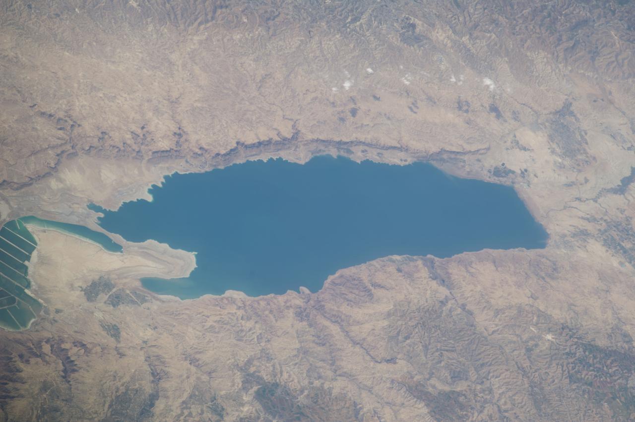 Earth observation taken by the Expedition 39 crew aboard the ISS. Image was released by astronaut on Twitter and downlinked in folder: Baikonur [Kazakhstan], Azerbaijan, Caspian Sea, etc.