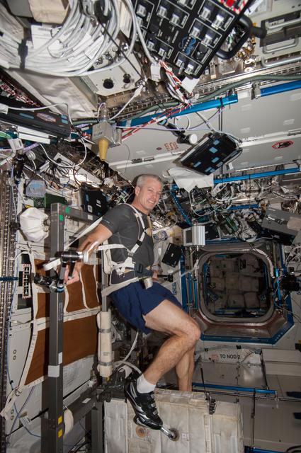 NASA image: Swanson exercises on the CEVIS in the US Lab
