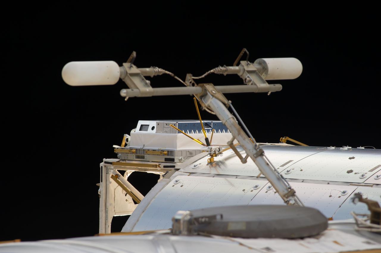 iss039e019134 (5/7/2014) - View of the High Definition Earth Viewing (HDEV) flight assembly installed on the exterior of the Columbus European Laboratory module. The High Definition Earth Viewing (HDEV) experiment places four commercially available HD cameras on the exterior of the space station and uses them to stream live video of Earth for viewing online. The cameras are enclosed in a temperature specific housing and are exposed to the harsh radiation of space. Analysis of the effect of space on the video quality, over the time HDEV is operational, may help engineers decide which cameras are the best types to use on future missions. High school students helped design some of the cameras' components, through the High Schools United with NASA to Create Hardware (HUNCH) program, and student teams operate the experiment.