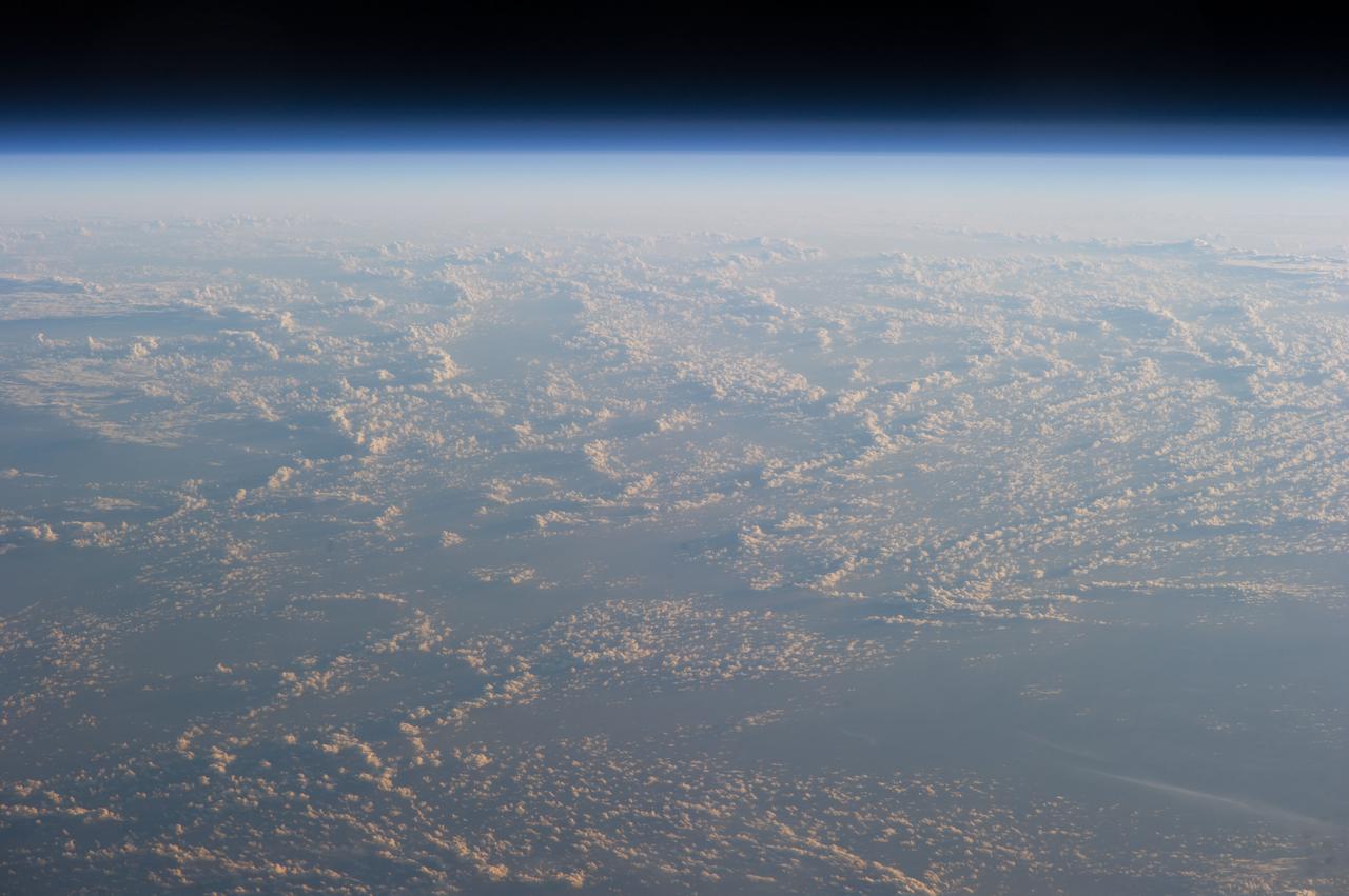 Earth Observation taken during a day pass by the Expedition 40 crew aboard the International Space Station (ISS). Folder lists this as: Clouds over South Pacific.