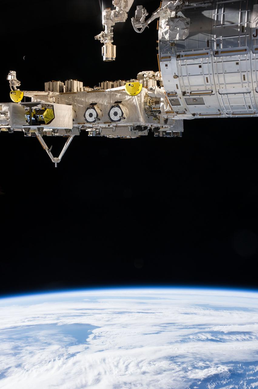 Earth Observation taken during a day pass by the Expedition 40 crew aboard the International Space Station (ISS). Folder lists this as:Straights of Magellan - Atlantic entrance - Clearish skies.  Part of the ISS JEM module External Platform is visible.