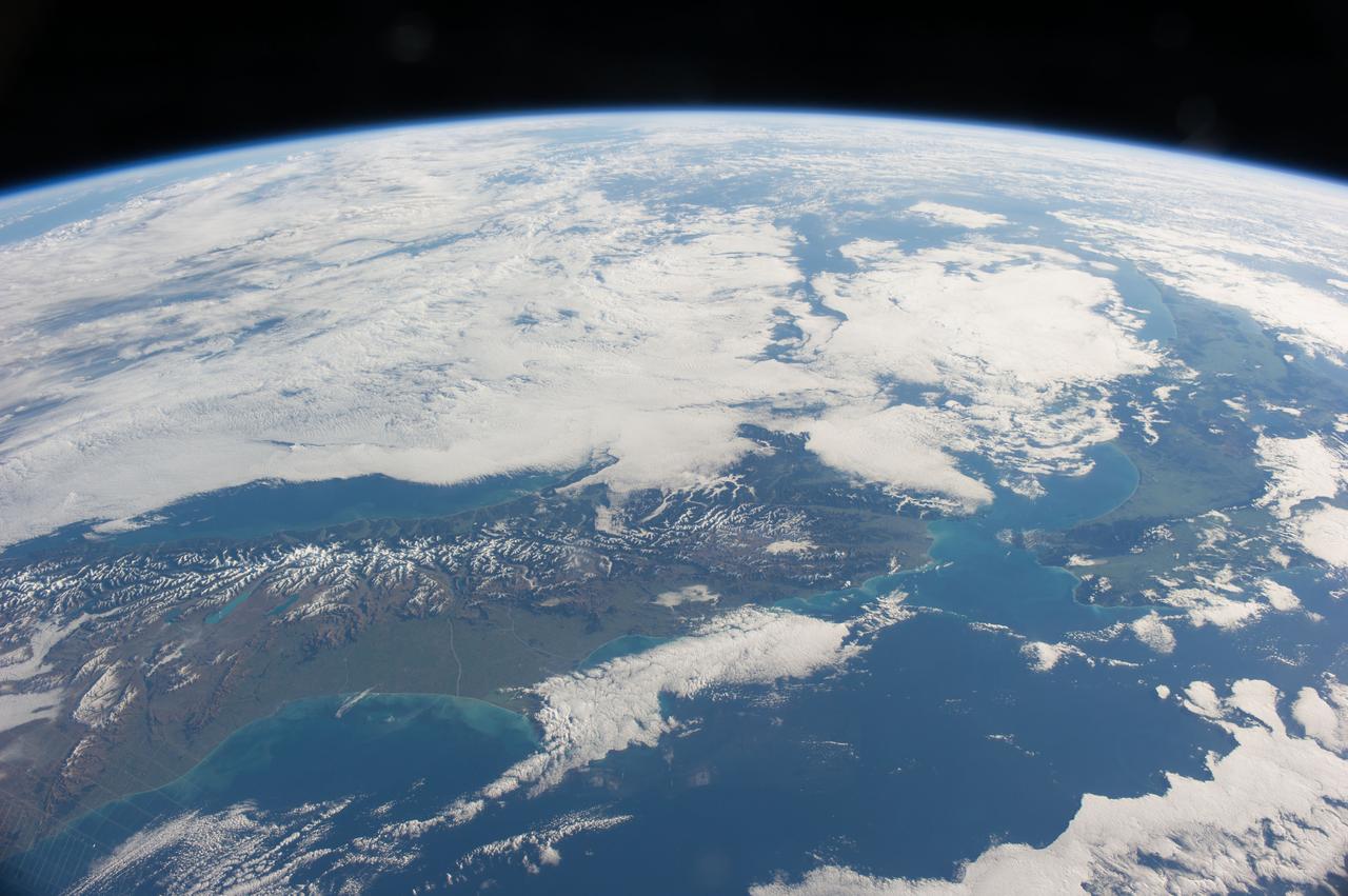 ISS040-E-007078 (3 June 2014) --- One of the Expedition 40 crew members aboard the International Space Station recorded this still image of much of New Zealand on June 3, 2014.  Clouds cover the Tasman Sea at top.  South Island is at left and North Island, at right. The orbital outpost was approximately  228 nautical miles above the South Pacific Ocean when the photograph was taken.