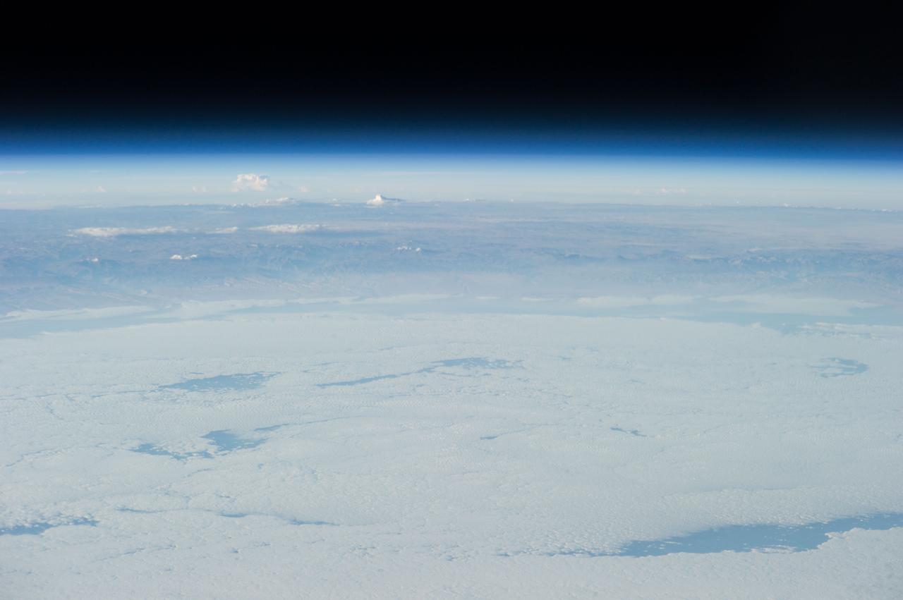 Earth Observation taken during a day pass by the Expedition 40 crew aboard the International Space Station (ISS). Folder lists items in this group as: Chile Atacama Bolivia Andes and active volcano.