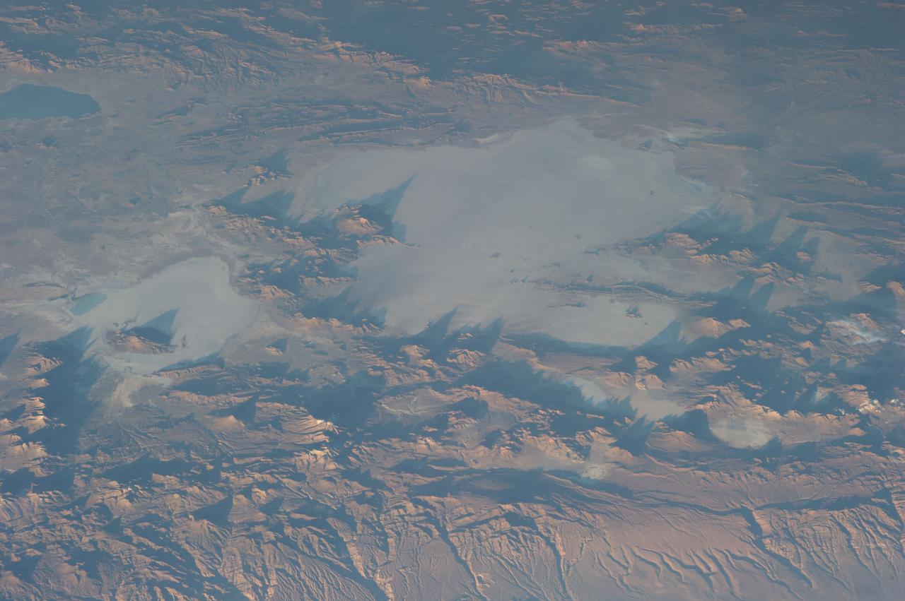 Earth Observation taken during a day pass by the Expedition 40 crew aboard the International Space Station (ISS). Folder lists items in this group as: Chile Atacama Bolivia Andes and active volcano.