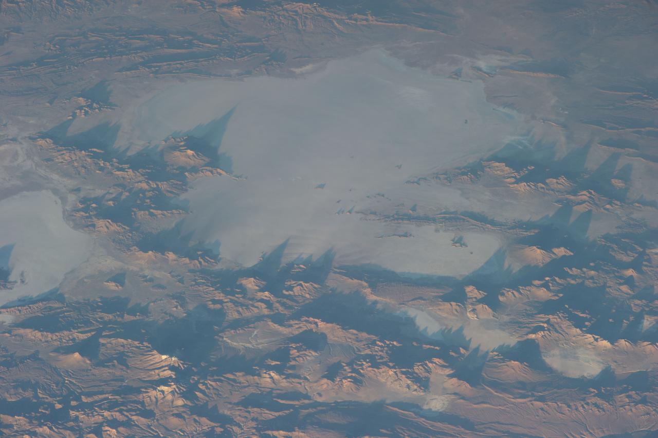 Earth Observation taken during a day pass by the Expedition 40 crew aboard the International Space Station (ISS). Folder lists items in this group as: Chile Atacama Bolivia Andes and active volcano.