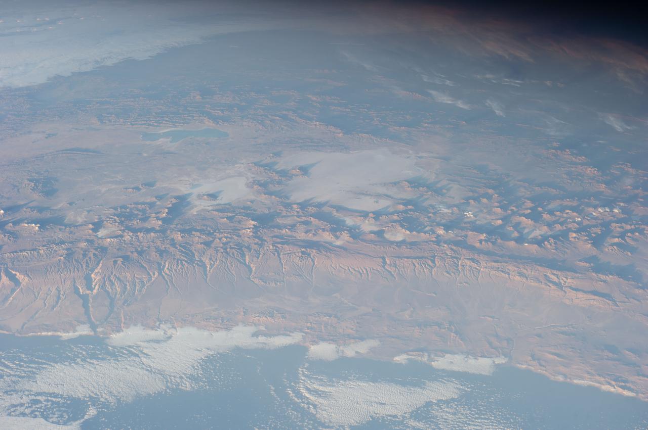 Earth Observation taken during a day pass by the Expedition 40 crew aboard the International Space Station (ISS). Folder lists items as: Andes 2, Atacama, Bolivia, Chile, Volcanos.