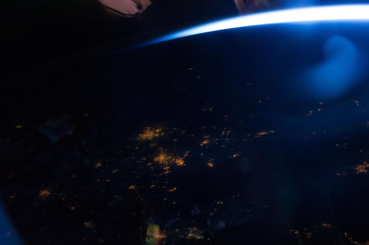 Earth Observation taken during a night pass by the Expedition 40 crew aboard the International Space Station (ISS). Folder lists this as: over China.