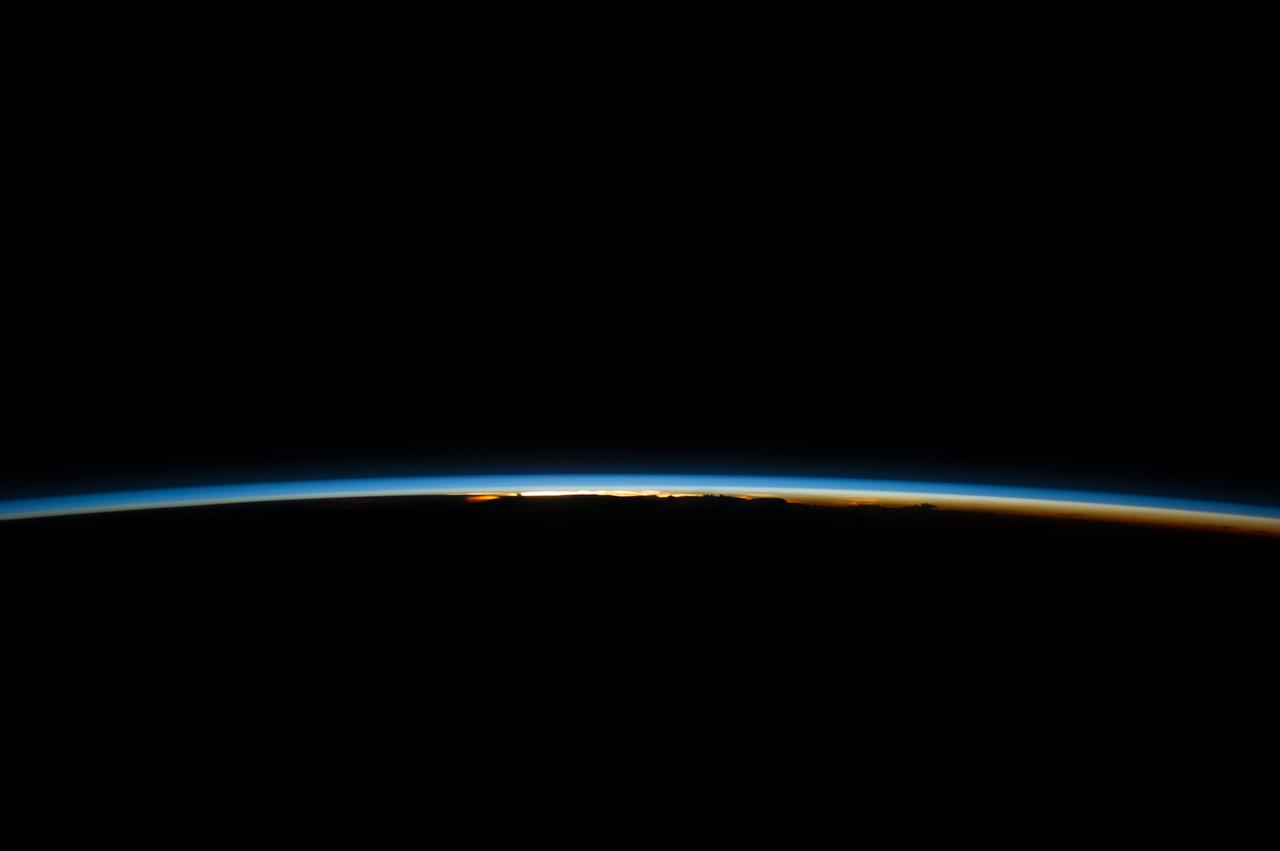 ISS040-E-008344 (8 June 2014) --- The thin line of Earth's atmosphere and the blackness of space are featured in this image photographed by an Expedition 40 crew member on the International Space Station.