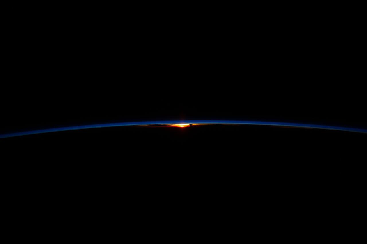 Earth Observation taken during a night pass by the Expedition 40 crew aboard the International Space Station (ISS). File lists this as possibly : Sunrise.