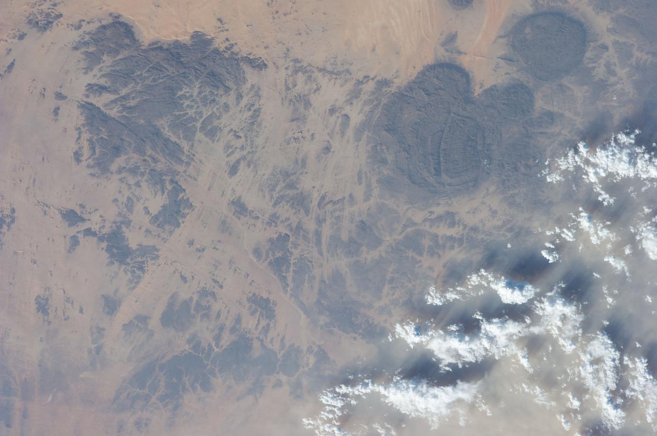 Earth observation taken during a day pass by the Expedition 40 crew aboard the International Space Station. File identifies it as: Sahara, and Libya.