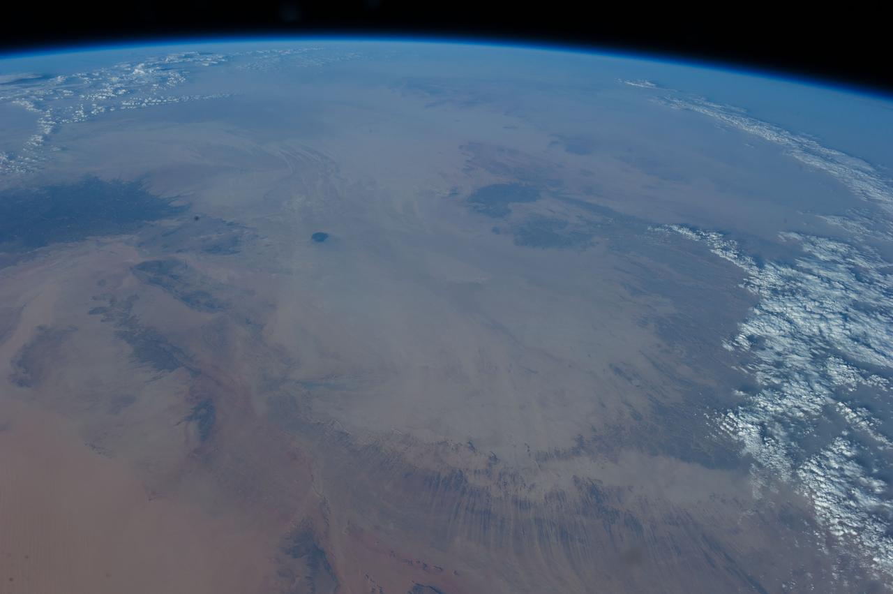 Earth observation taken during a day pass by the Expedition 40 crew aboard the International Space Station. File identifies it as: Sahara, and Libya.