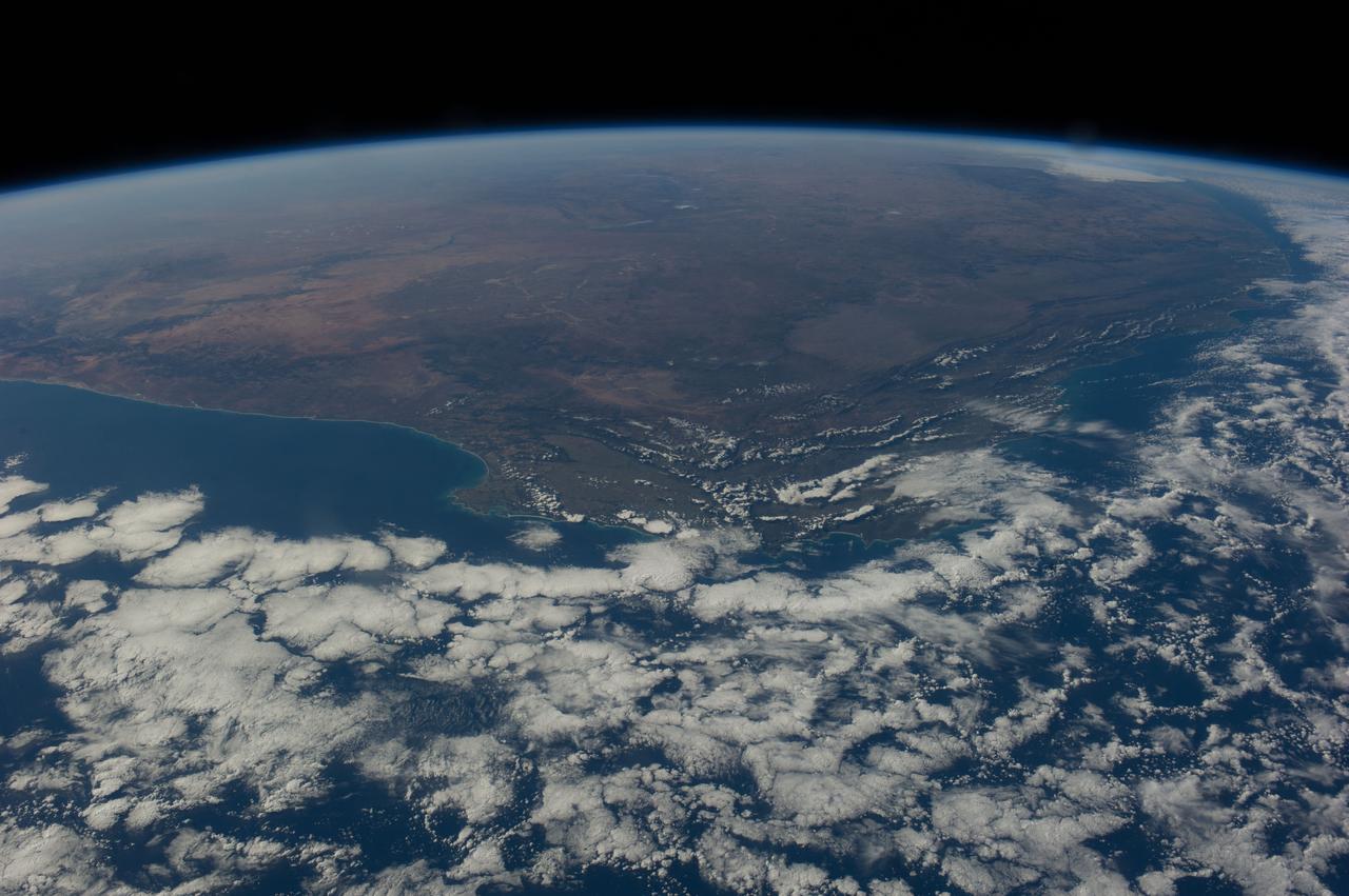 Earth Observation taken during a day pass by the Expedition 40 crew aboard the International Space Station (ISS). Folder lists this as: EOS South Africa Cape Town JoBurg Vredefort Crater.