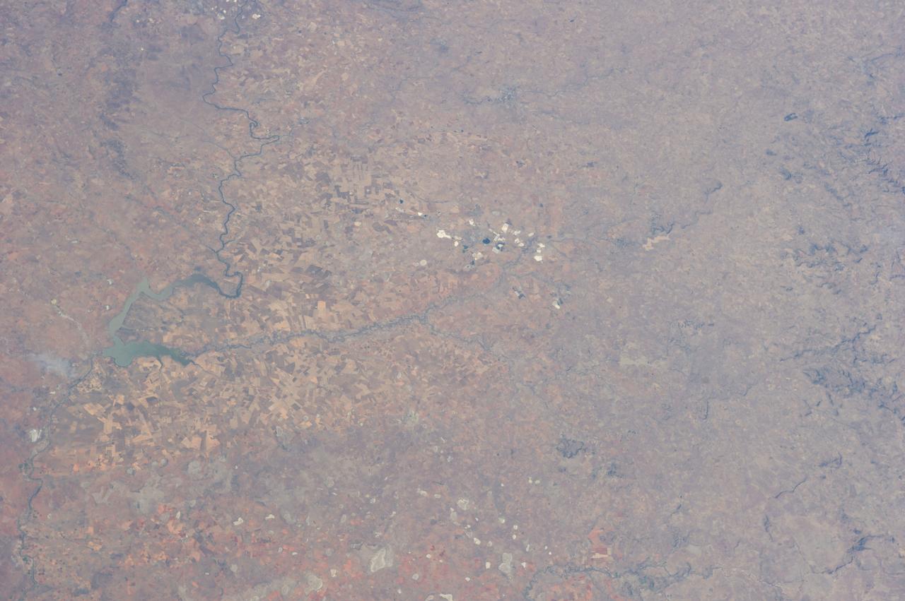 Earth Observation taken during a day pass by the Expedition 40 crew aboard the International Space Station (ISS). Folder lists this as: EOS South Africa Cape Town JoBurg Vredefort Crater.