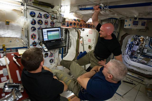NASA image: Expedition 40 crew watch World Cup match