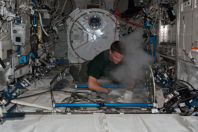 NASA image: HRF â Urine Sample MELFI Insertion