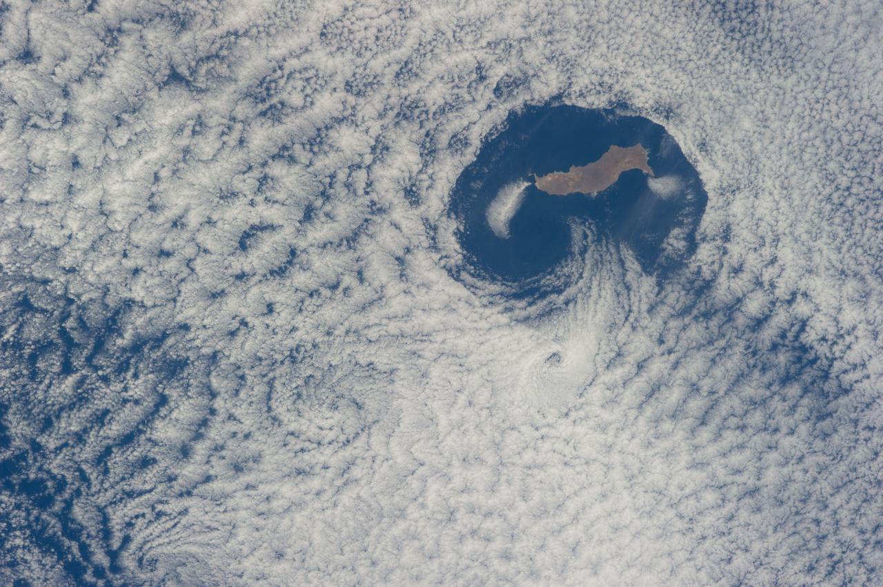 ISS040-E-016569 (21 June 2014) --- From an altitude of 223 nautical miles, one of the Expedition 40 crew members on the International Space Station photographed this nearly vertical image of Guadalupe Island and the Von Karman cloud vortices that are its storied neighbors just off southern California's Pacific Coast.