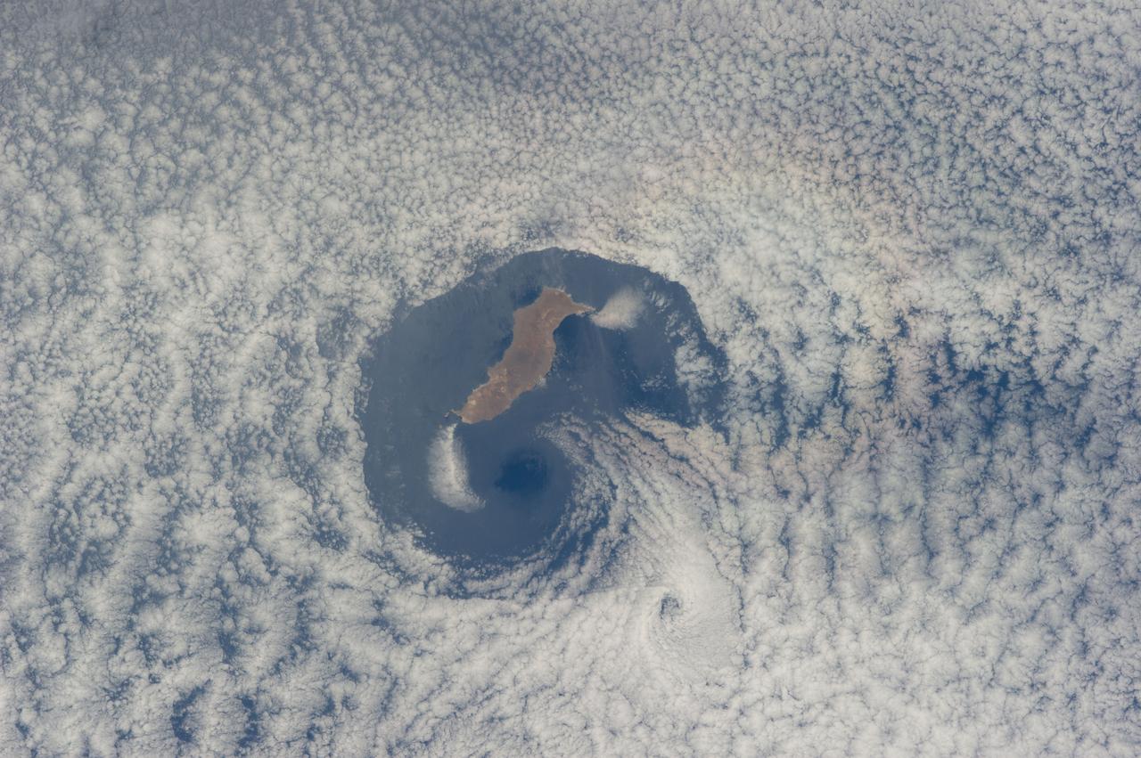 ISS040-E-016570 (21 June 2014) --- From an altitude of 223 nautical miles, one of the Expedition 40 crew members on the International Space Station photographed this nearly vertical image of Guadalupe Island and the Von Karman cloud vortices that are its storied neighbors just off southern California's Pacific Coast.