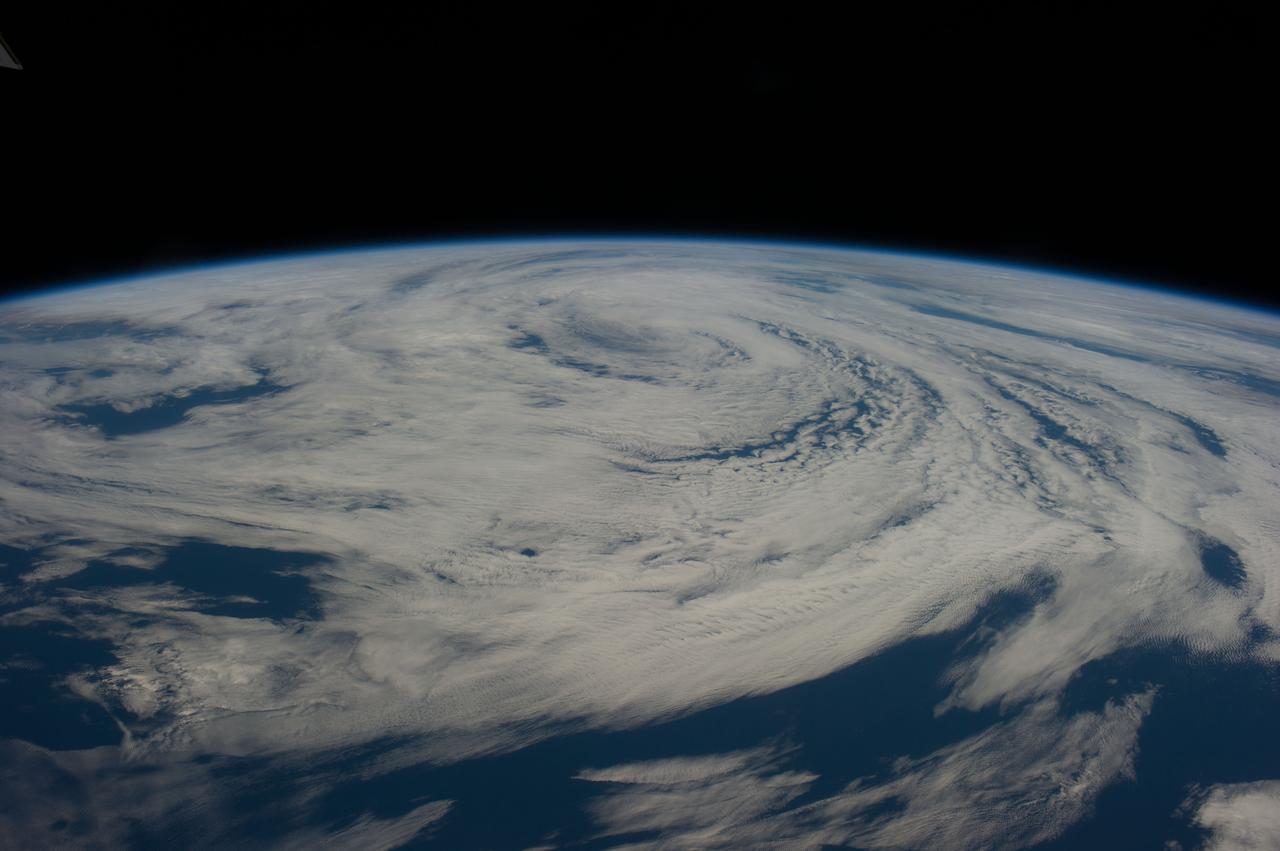 ISS040-E-017316 (23 June 2014) --- As the International Space Station was passing over the North Atlantic Ocean, just east of Newfoundland, on June 23, 2014, one of the Expedition 40 crew members on the orbital outpost recorded this panoramic view of the swirling bands of a mature, not dangerous non-tropical, cyclone. Such cyclonic activity is not unusual for this time of year in that area.