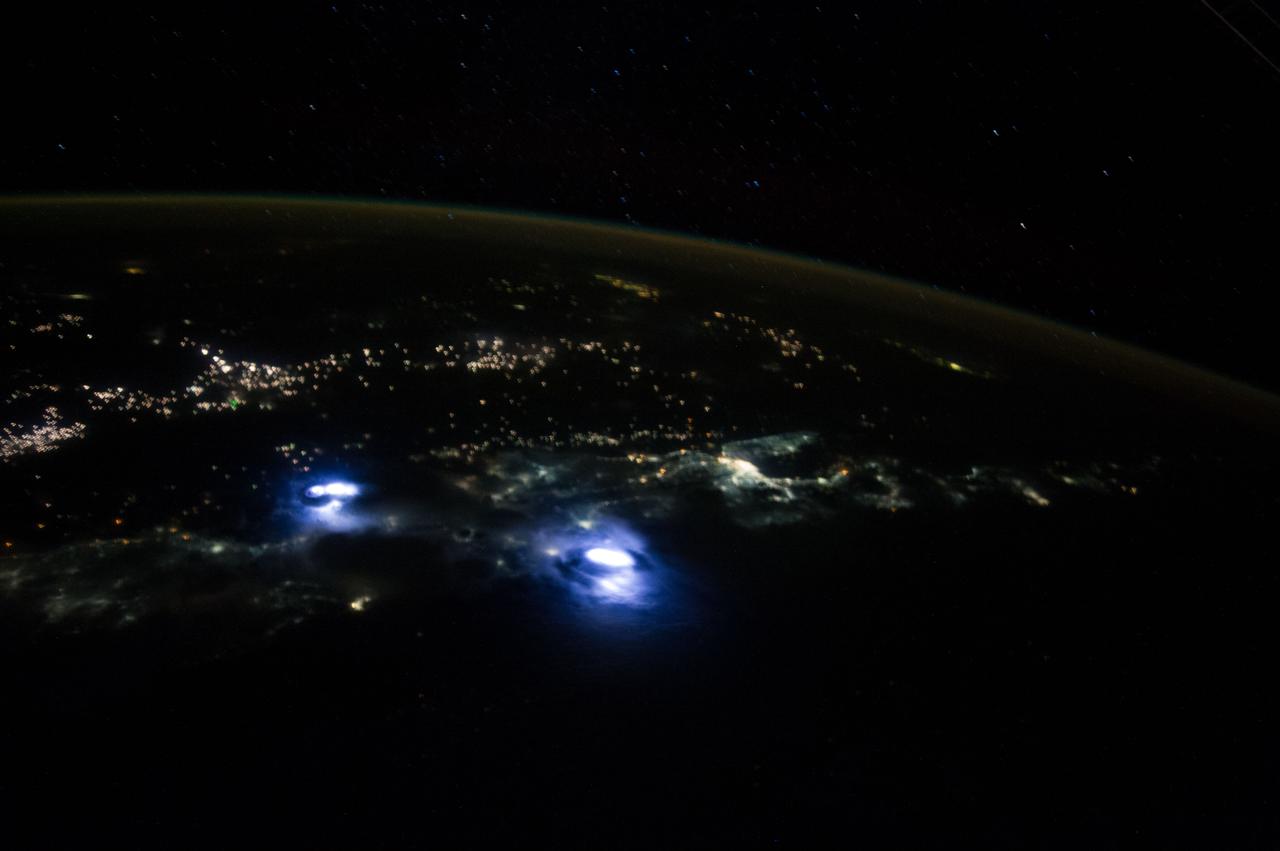 Earth observation taken during a night pass by the Expedition 40 crew aboard the International Space Station (ISS). Folder lists this as: night approach to Singapore.
