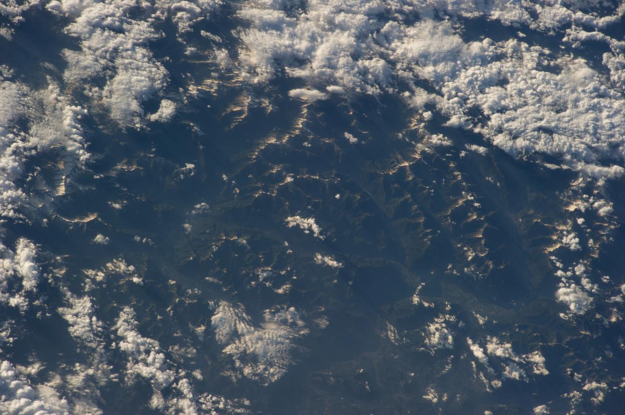 Earth Observation taken by the Expedition 40 crew aboard the International Space Station (ISS). Folder lists this as: Alps & Italy (Naples coast).