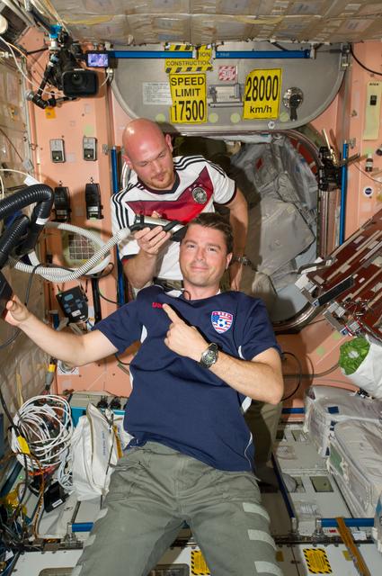 Expedition 40 crew in Node 2 after German - U.S. soccer game