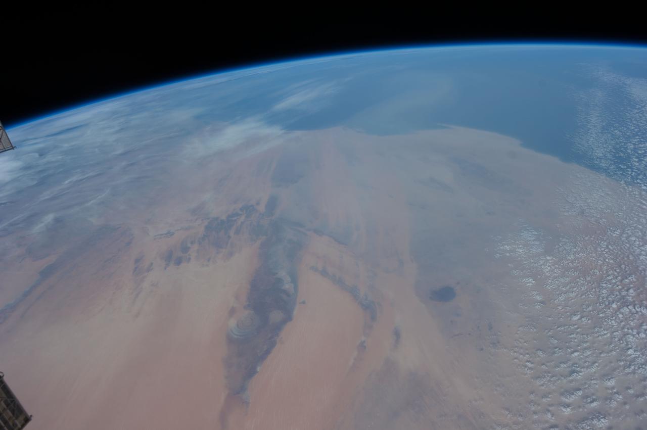 Earth Observation taken during a day pass by the Expedition 40 crew aboard the International Space Station (ISS). File lists this as:weird bullseye over Africa..