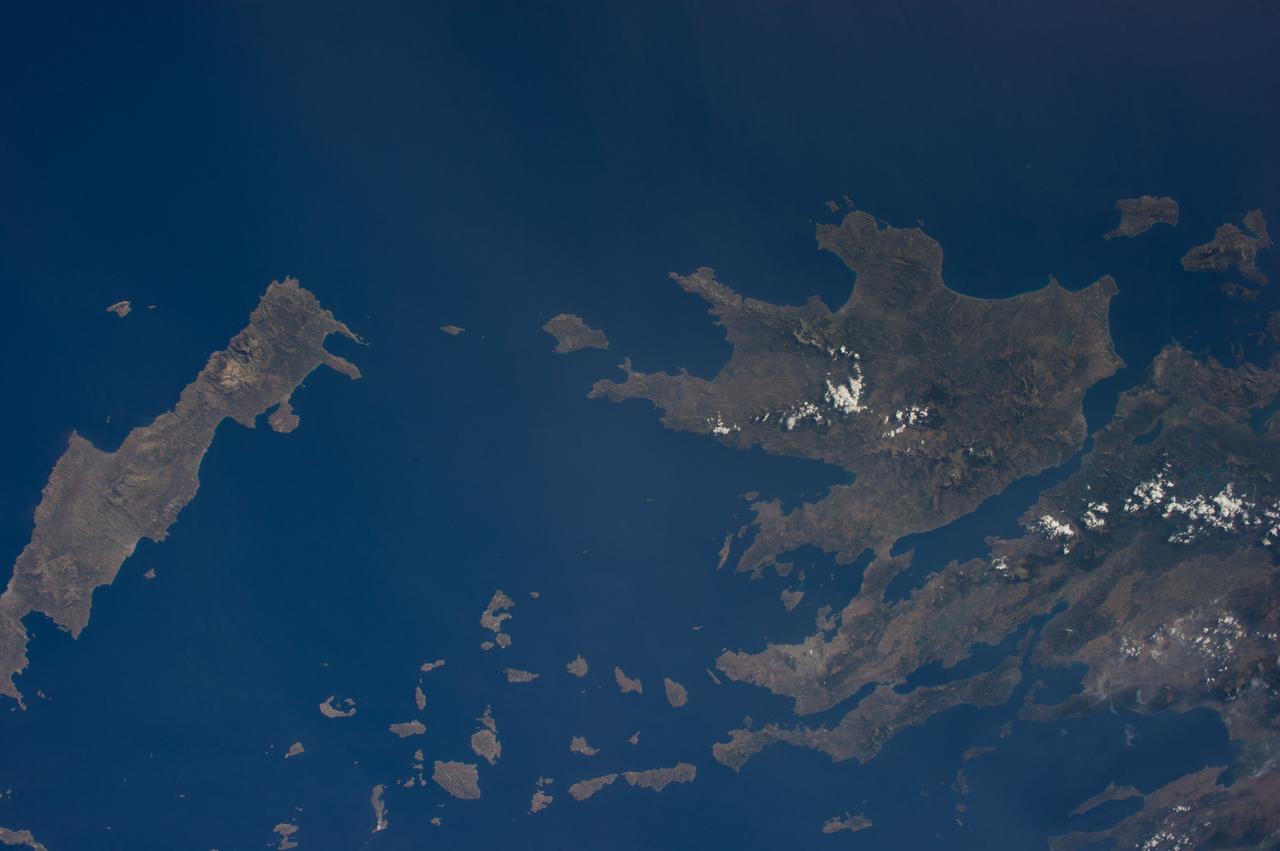 ISS040-E-033303 (3 July 2014) --- One of the Expedition 40 crew members aboard the International Space Station photographed this image from an altitude of 225 nautical miles, featuring the Ionian Sea (top), Crete (southernmost island at left), the Cyclades (bottom center) and much of Greece's land mass  (right, or northernmost part of the frame).