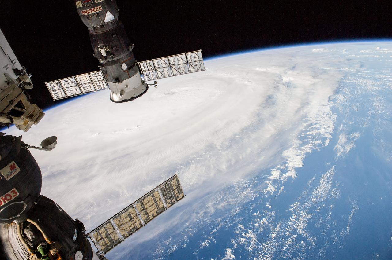 ISS040-E-038893 (5 July 2014) --- One of the Expedition 40 crew members onboard the International Space Station photographed this image of Super Typhoon Neoguri headed toward Japan at 21:57:39 GMT on July 5, 2014. A Russian Soyuz vehicle, docked to the orbital outpost, is partially visible in the foreground, and a docked Russian Progress is seen in upper left.