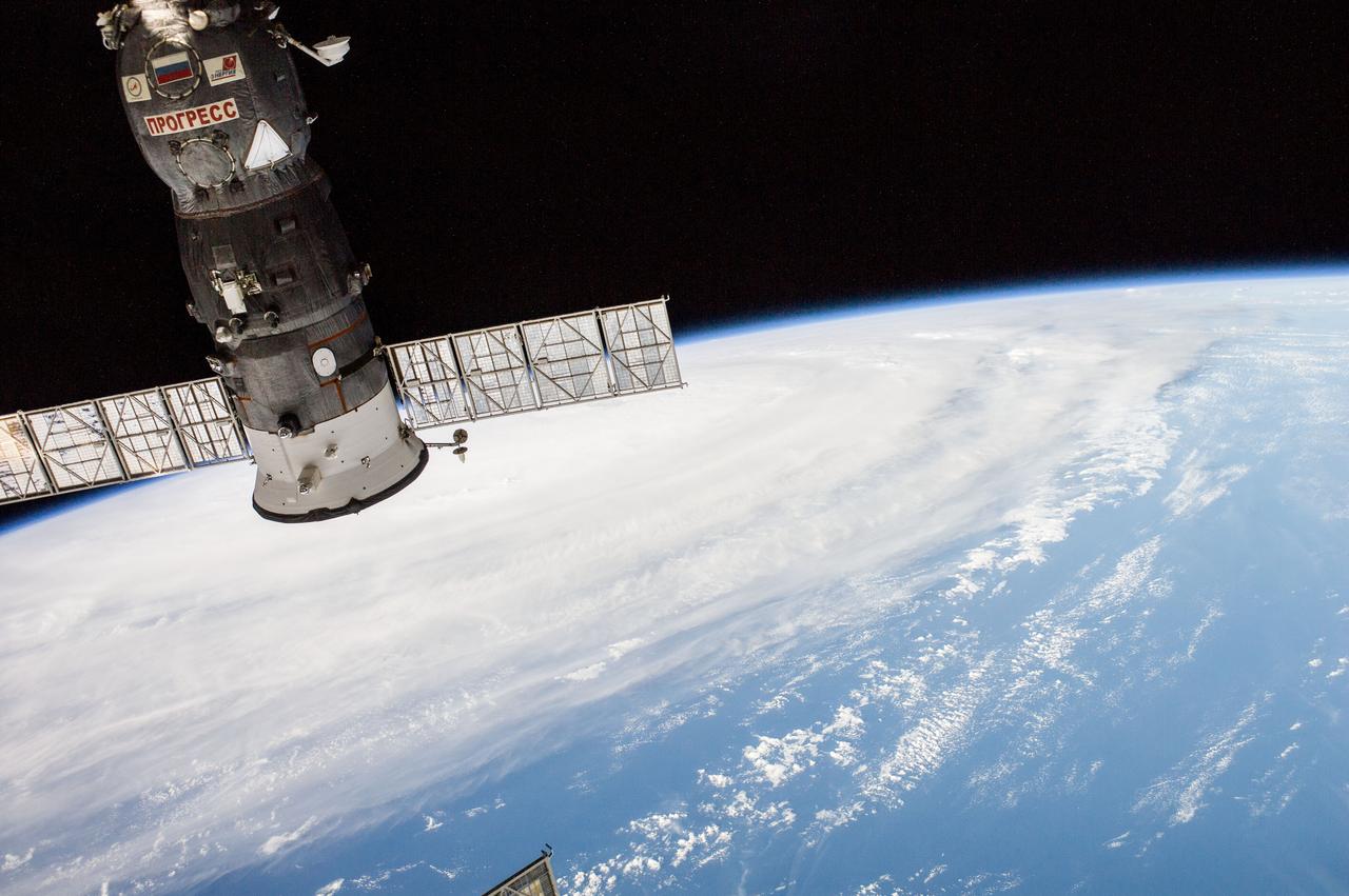 ISS040-E-038897 (5 July 2014) --- One of the Expedition 40 crew members onboard the International Space Station photographed this image of Super Typhoon Neoguri headed toward Japan at 21:58:27 GMT on July 5, 2014. A Russian Progress vehicle, docked to the orbital outpost, is in the foreground.