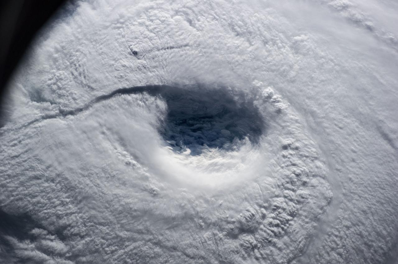 ISS040-E-045634 (7 July 2014) --- The International Space Station passed directly over the eye of Typhoon Neoguri on July 7, and Expedition 40 Flight Engineer Alexander Gerst of the European Space Agency captured its startling dimensions in a series of still photos. In a tweet, Gerst marveled that even with a fish-eye lens (which was used on some more distant angles other than this almost nadir one), he couldn't capture the whole storm. A 70mm focal length was used for a small sequence of close-up eye pictures such as this one. The picture was taken at 21:53:45 GMT on July 7, 2014.