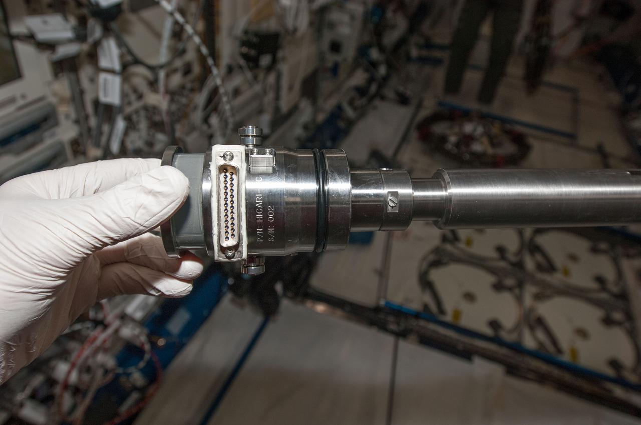 iss040e054521 (7/10/2014) --- A photo of Hicari sample cartridge 2 from the Gradient Heating Furnace (GHF) removed in preparation for return on SpaceX-4. The materials science investigation Growth of Homogeneous SiGe Crystals in Microgravity by the TLZ Method (Hicari) aims to verify the crystal-growth by Travelling Liquidous Zone method, and to produce high-quality crystals of Silicon-Germanium (SiGe) semiconductor using the Japanese Experiment Module-Gradient Heating Furnace (JEM-GHF).