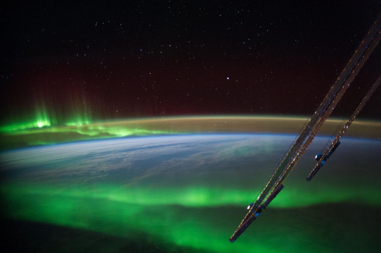 ISS040-E-065887 (15 July 2014) --- One of the more spectacular scenes of the Aurora Australis was photographed by one of the Expedition 40 crew members aboard the International Space Station from an altitude of approximately 223 nautical miles on July 15, 2014. The crew member used a 50mm lens to record the image as the orbital outpost was over a point south of Australia. Parts of solar array panels of the space station are visible at right.