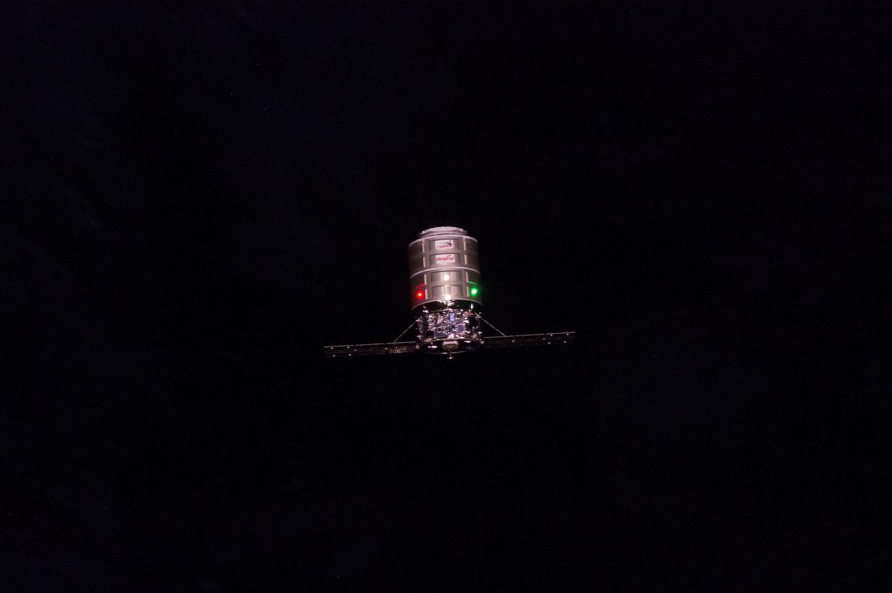 ISS040-E-069066 (16 July 2014) --- Surrounded by the blackness of space, the Orbital Sciences? Cygnus cargo craft is photographed by an Expedition 40 crew member onboard the International Space Station during rendezvous and capture operations. The two spacecraft converged at 6:36 a.m. (EDT) on July 16, 2014.