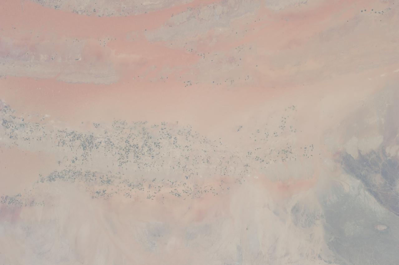 Distant view of the Orbital Sciences Cygnus cargo craft approaching the International Space Station, photographed by an Expedition 40 crew member. The two spacecraft converged at 6:36 a.m. (EDT) on July 16, 2014.