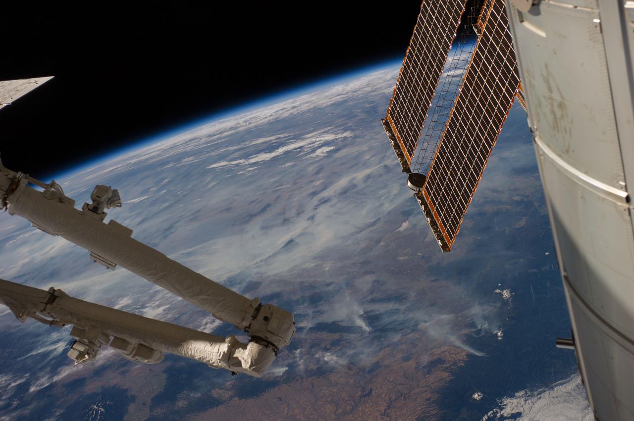 Earth observation taken during day pass by the Expedition 40 crew aboard the International Space Station (ISS). Folder lists this as: Pacific Northwest Wildfires.