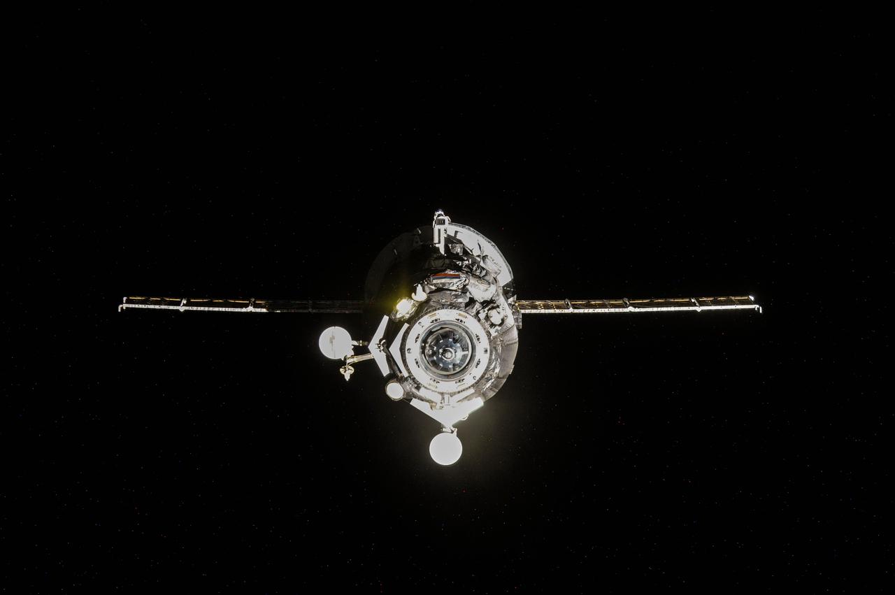 ISS040-E-070870 (21 July 2014) --- The unpiloted Russian ISS Progress 55 resupply ship undocks from the International Space Station's Pirs Docking Compartment at 5:44 p.m. (EDT) on July 21, 2014 after spending more than three months at the orbiting complex. After undocking, the Progress moved to a safe distance away from the station for 10 days of engineering tests before it is deorbited on July 31. Filled with trash and station discards, Progress 55 will burn up as it re-enters Earth?s atmosphere over the Pacific Ocean.