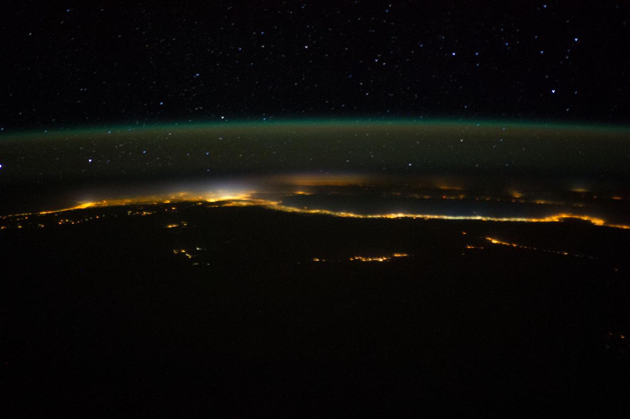 Earth observation taken during a night pass by the Expedition 40 crew aboard the International Space Station. Folder lists this as: Night-Egypt & war in Israel - missile impacts.