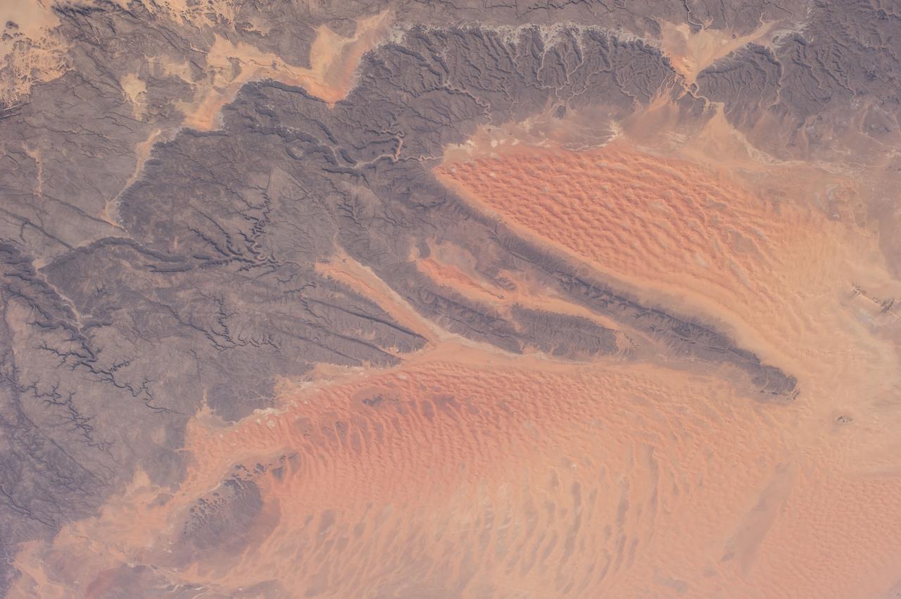Earth Observation taken during a day pass by the Expedition 40 crew aboard the International Space Station (ISS). Folder lists this as:  Sahara.