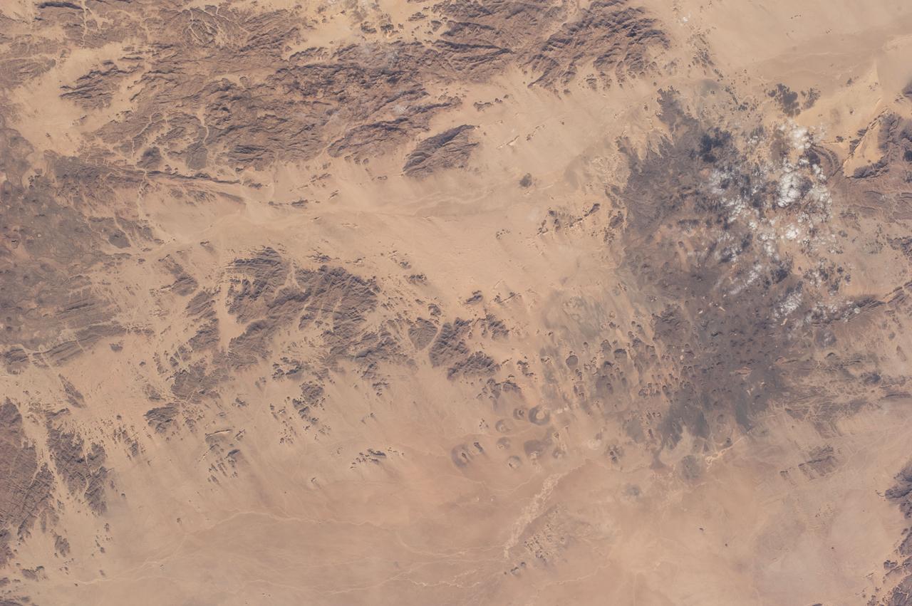Earth Observation taken during a day pass by the Expedition 40 crew aboard the International Space Station (ISS). Folder lists this as:  Sahara.