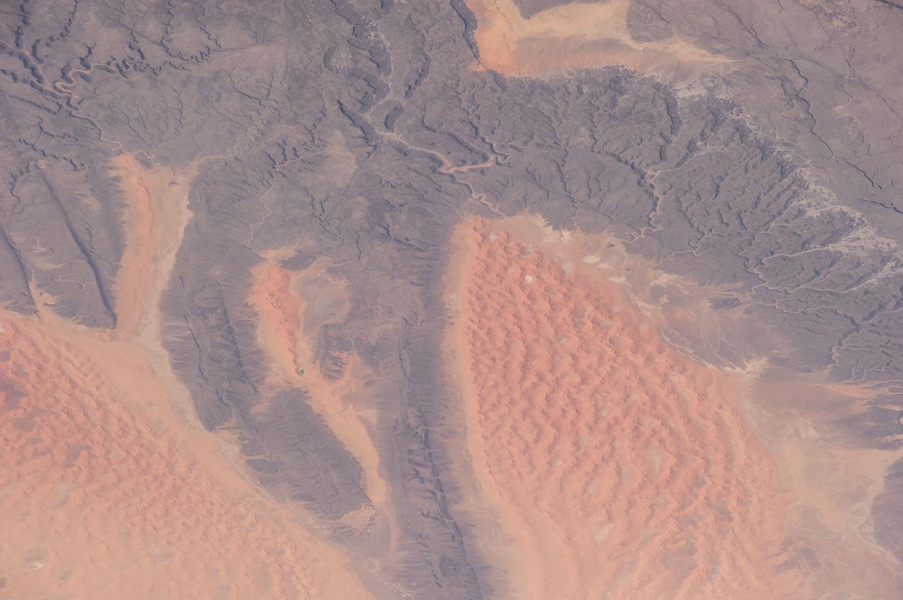 Earth Observation taken during a day pass by the Expedition 40 crew aboard the International Space Station (ISS). Folder lists this as:  Sahara.