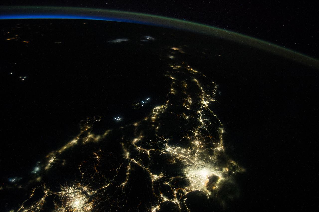 Earth observation taken during a night pass by the Expedition 40 crew aboard the International Space Station (ISS). Folder lists this as: Taiwan, Japan, and fishing boats at night.