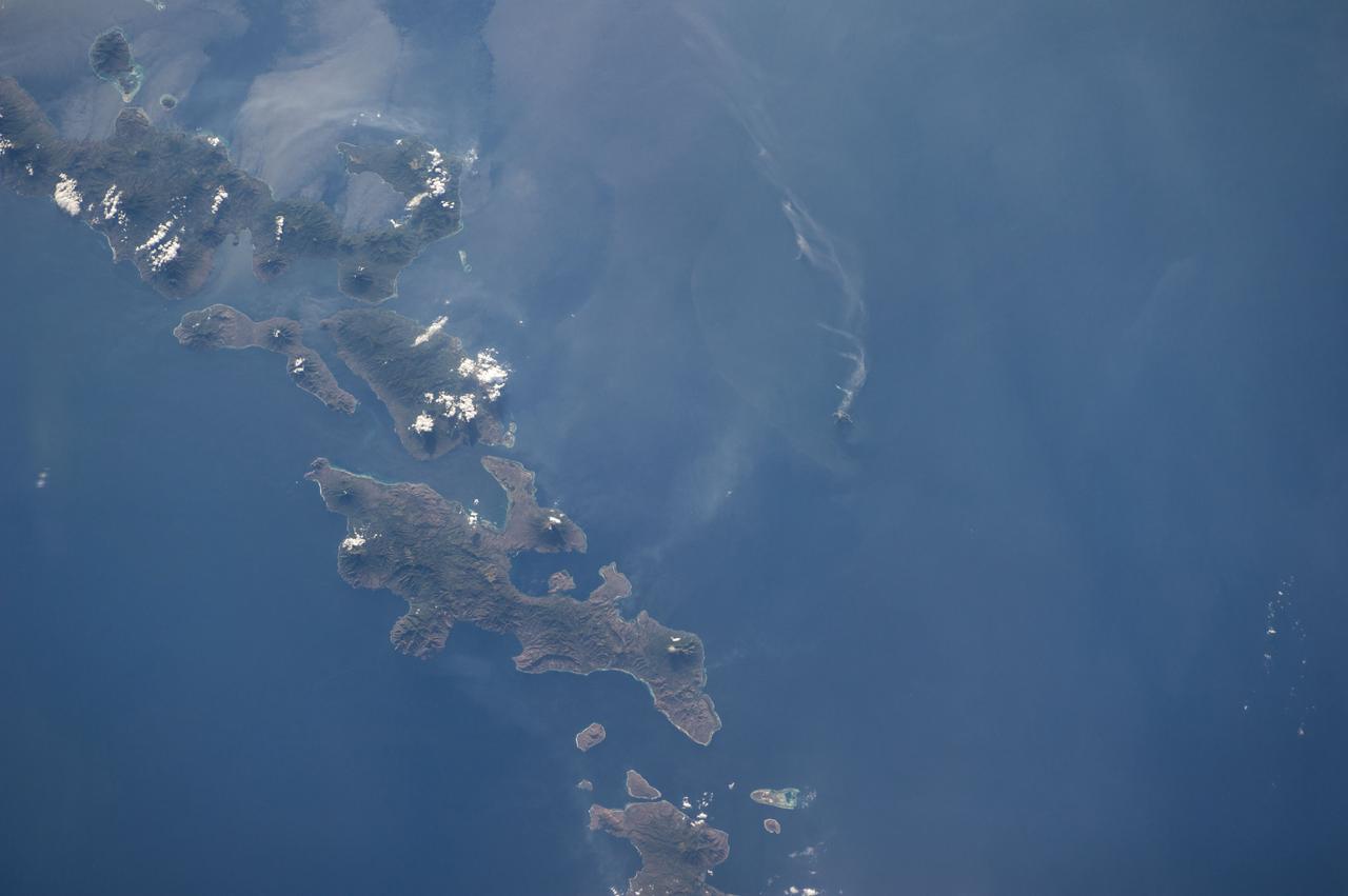 Earth observation taken by the Expedition 40 crew aboard the International Space Station (ISS). Folder lists this as: Indonesian volcano.