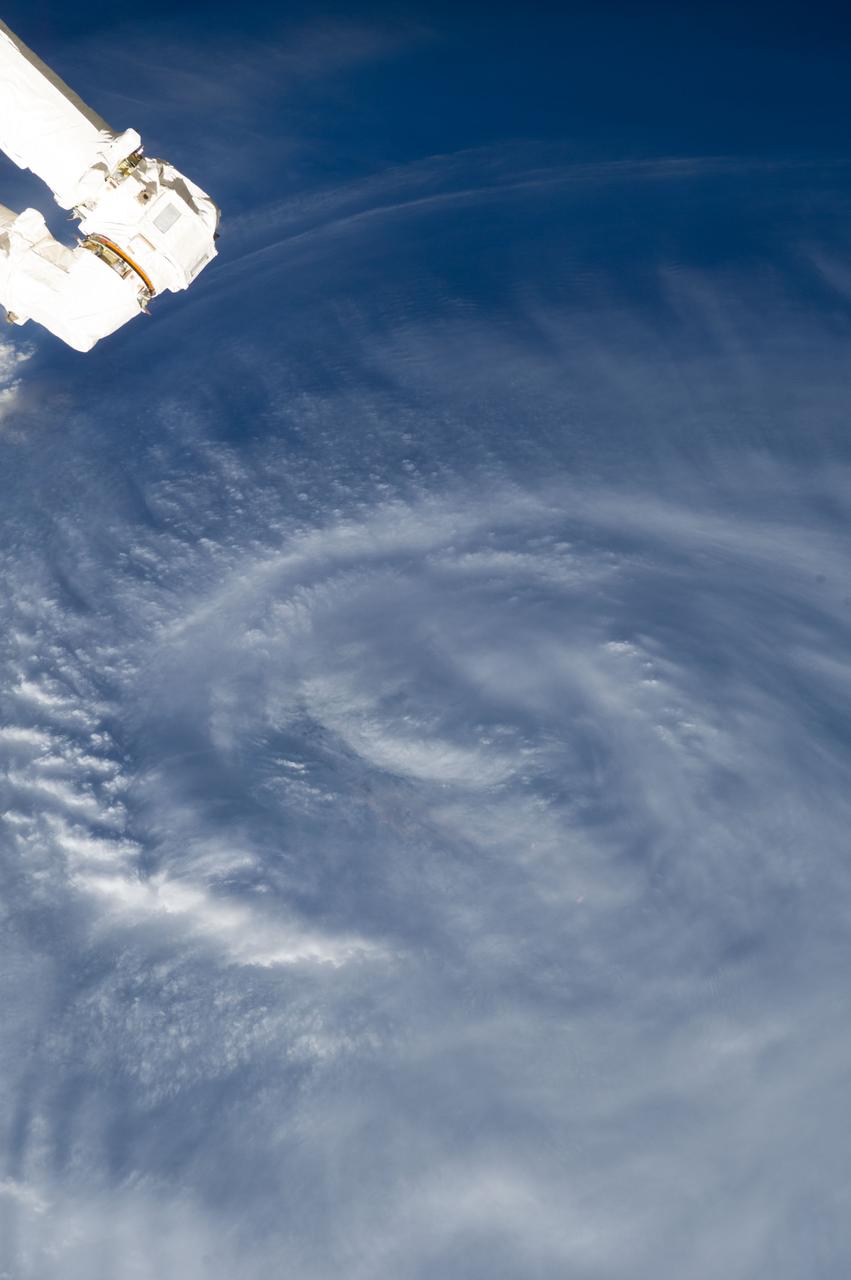ISS040-E-089388 (7 Aug. 2014) --- One of the Expedition 40 crew members aboard the International Space Station, from an altitude of 221 nautical miles, photographed this image of Typhoon Halong at 09:39:02 GMT on Aug. 7, 2014. The orbital outpost was flying directly above a point on Earth located at 26.1 degrees north latitude and 127.8 degrees east longitude. Part of one of the station's robot arms can be seen in upper left.