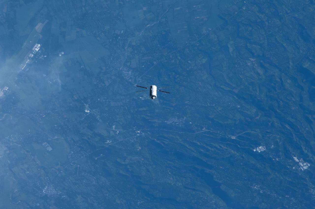 ISS040-E-089782 (8 Aug. 2014) --- The “Georges Lemaitre” Automated Transfer Vehicle (ATV-5), photographed by an Expedition 40 crew member, flies directly under the International Space Station at a distance of about 3.7 miles to test sensors and radar systems designed for future European spacecraft. After its “fly-under” of the station, the ATV will move in front of, above, and behind the outpost for the final days of its two-week rendezvous that will lead to an automated docking to the aft port of the Zvezda Service Module on Aug. 12.
