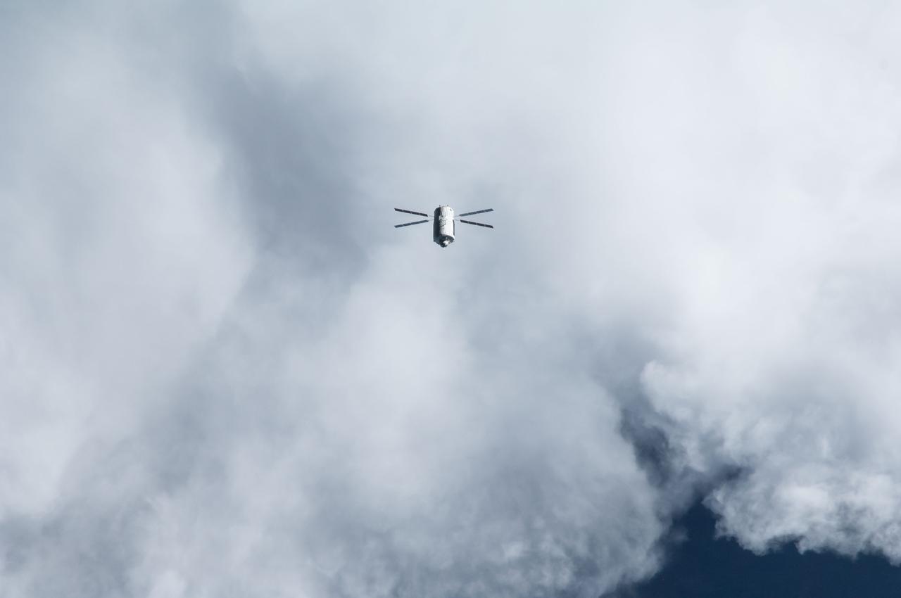 ISS040-E-089793 (8 Aug. 2014) --- The “Georges Lemaitre” Automated Transfer Vehicle (ATV-5), photographed by an Expedition 40 crew member, flies directly under the International Space Station at a distance of about 3.7 miles to test sensors and radar systems designed for future European spacecraft. After its “fly-under” of the station, the ATV will move in front of, above, and behind the outpost for the final days of its two-week rendezvous that will lead to an automated docking to the aft port of the Zvezda Service Module on Aug. 12.