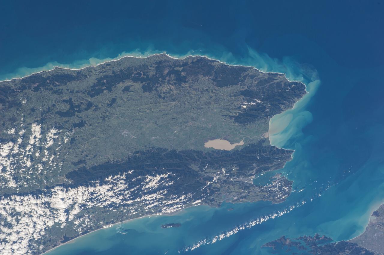 ISS040-E-091153 (10 Aug. 2014) --- One of the Expedition 40 crew members aboard the International Space Station, flying at an altitude of 225 nautical miles, exposed this image of the south end of New Zealand's North Island on Aug. 10, 2014. Lake Wellington is just to the right of center frame. The north end of South Island is out of frame on the right side of Cook Strait at far right.