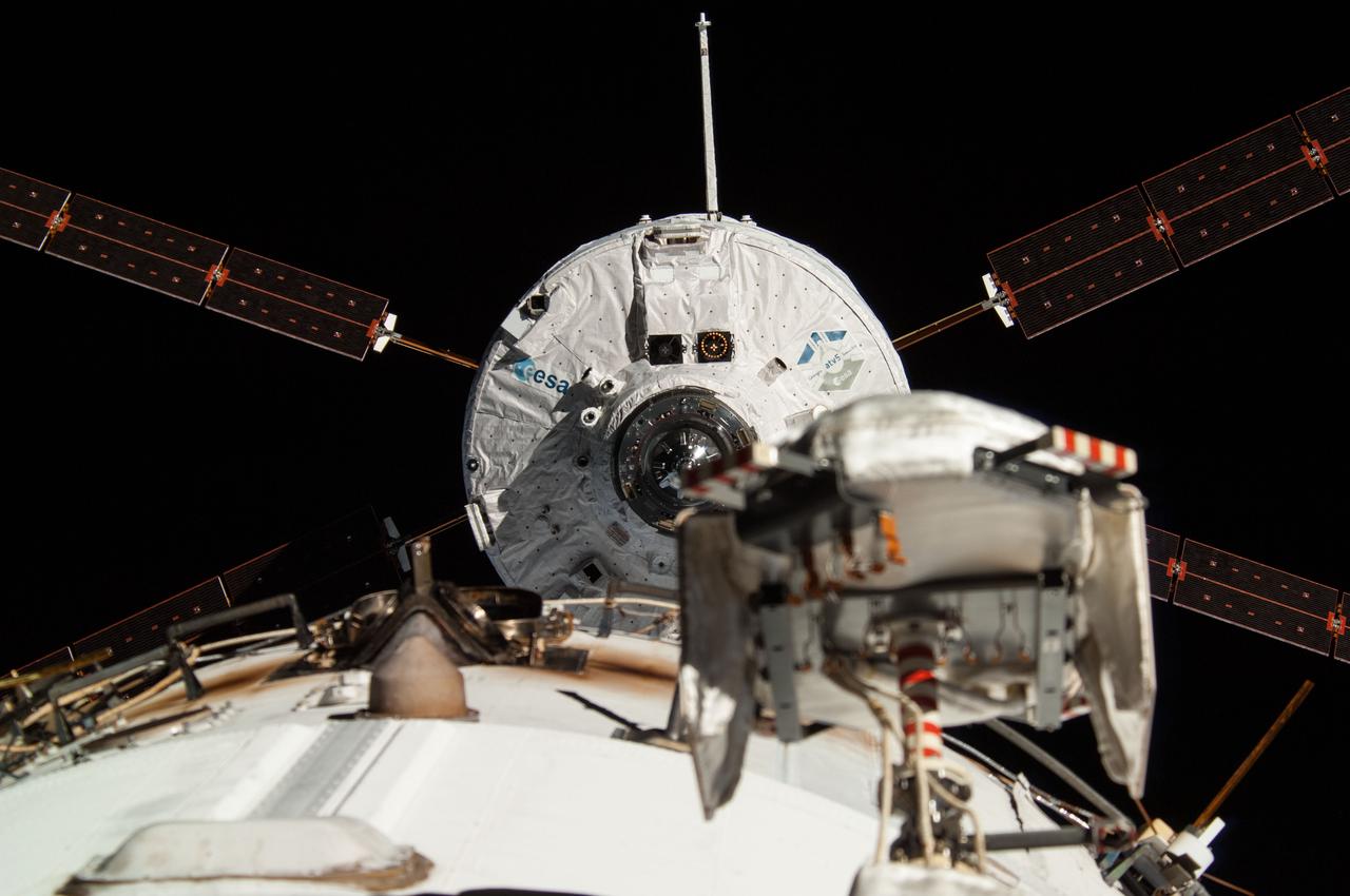 ISS040-E-091366 (12 Aug. 2014) --- The ?Georges Lemaitre? Automated Transfer Vehicle (ATV-5), photographed by an Expedition 40 crew member, is about to dock to the aft port of the International Space Station?s Zvezda Service Module. Docking occurred at 8:30 a.m. (CDT) as the ATV and the station flew 260 miles over southern Kazakhstan, following a two-week period of free-flight.